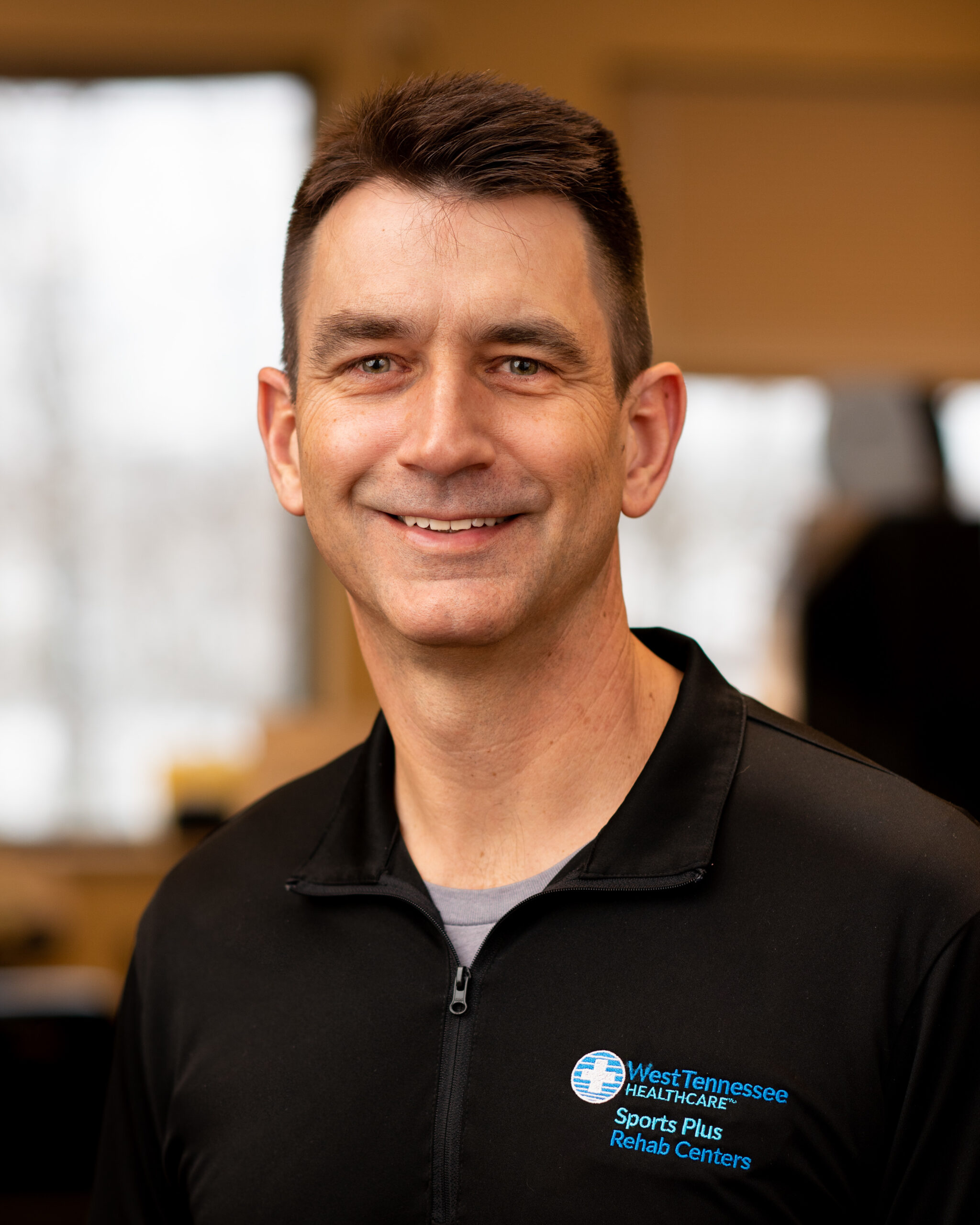 Environmental portrait of Sports Plus Humboldt employee and manager Jeff Lansdale.